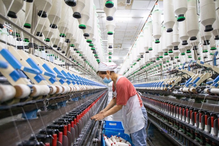 Cina: industria tessile registra crescita nei primi 9 mesi